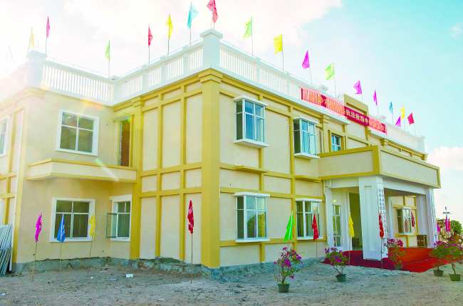 28 July 2016: Drummond Island finishes construction of its PAFD and militia outpost multipurpose building. Image source: Macao Daily